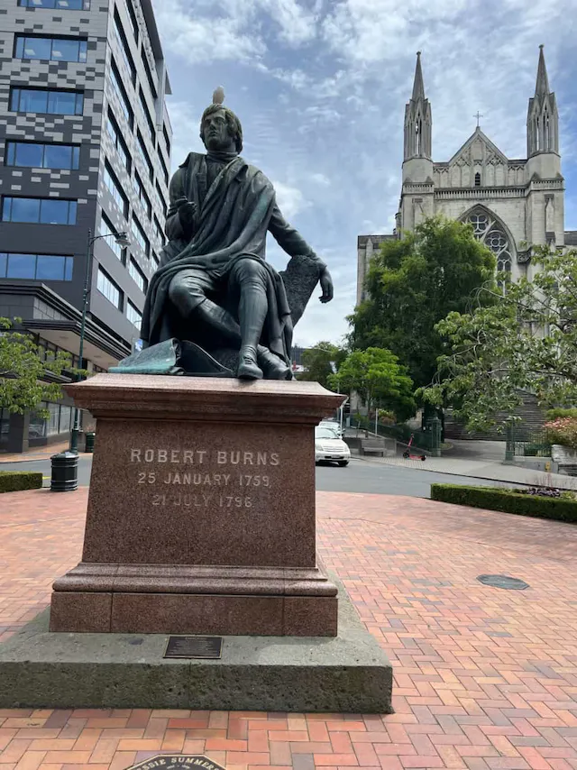 Robbie Burns in Dunedin with a seagull on his head